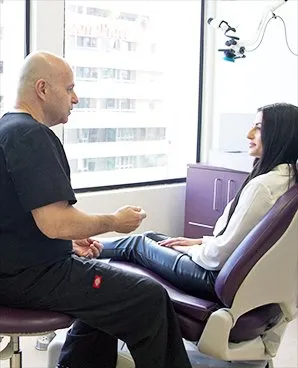 Doctor Georgas talking with patient