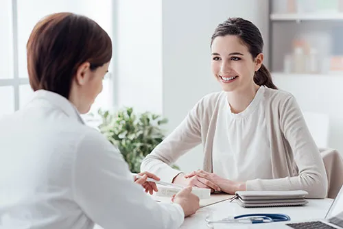 Doctor talking to patient