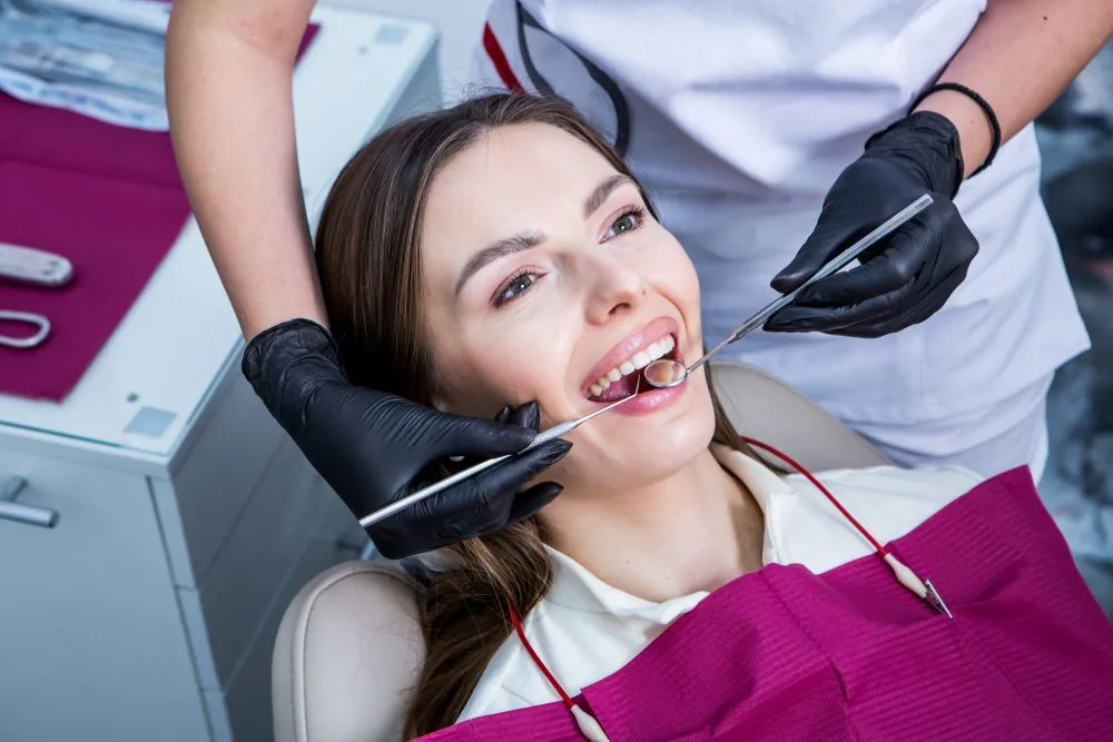 Woman getting her gums examined